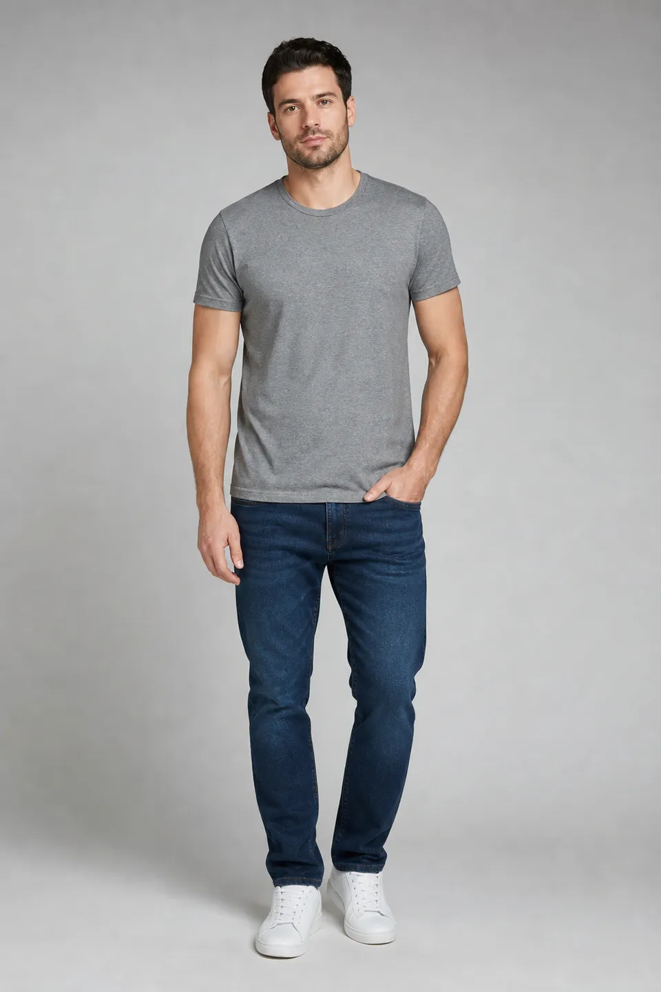 Man in grey t-shirt and jeans
